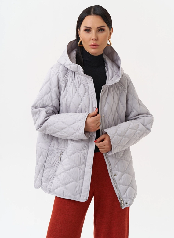 Женская стеганая куртка с капюшоном фото
